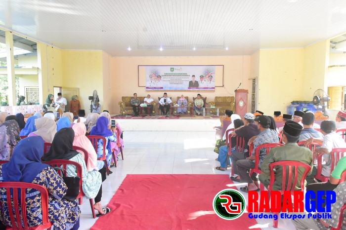 Bupati Bengkalis Serahkan Bantuan Penampung Air Hujan